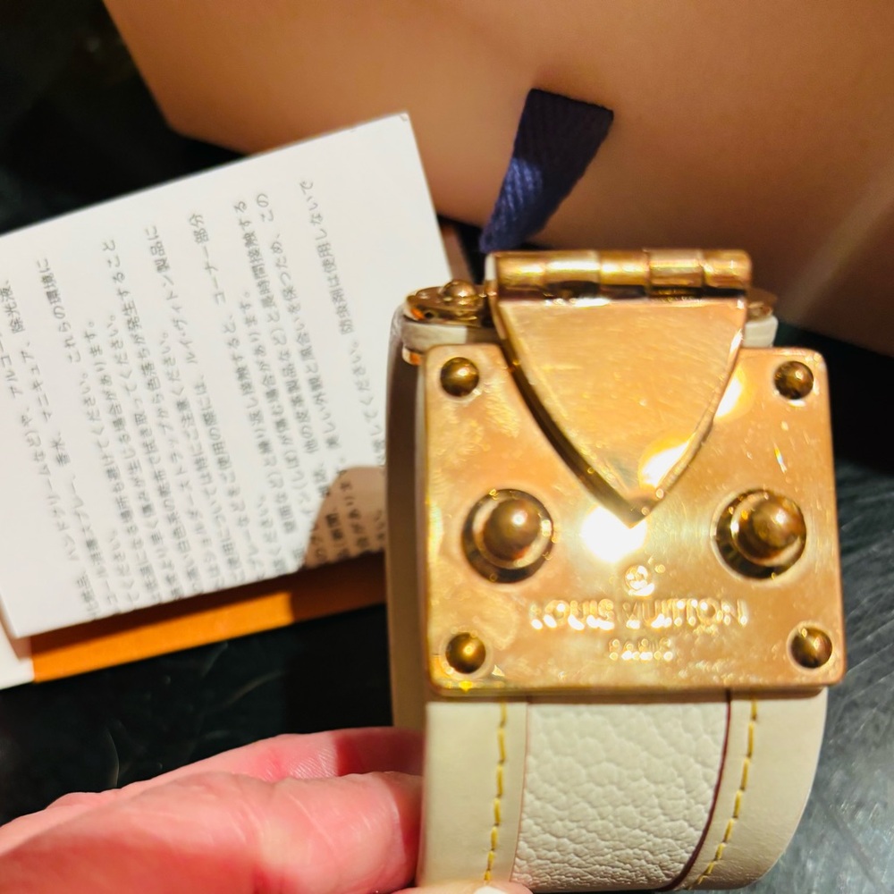 Louis Vuitton S-Lock Gold and Cream Cuff Bracelet
